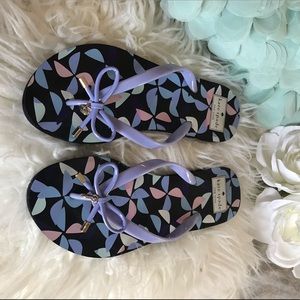 Purple Kate Spade flip flops